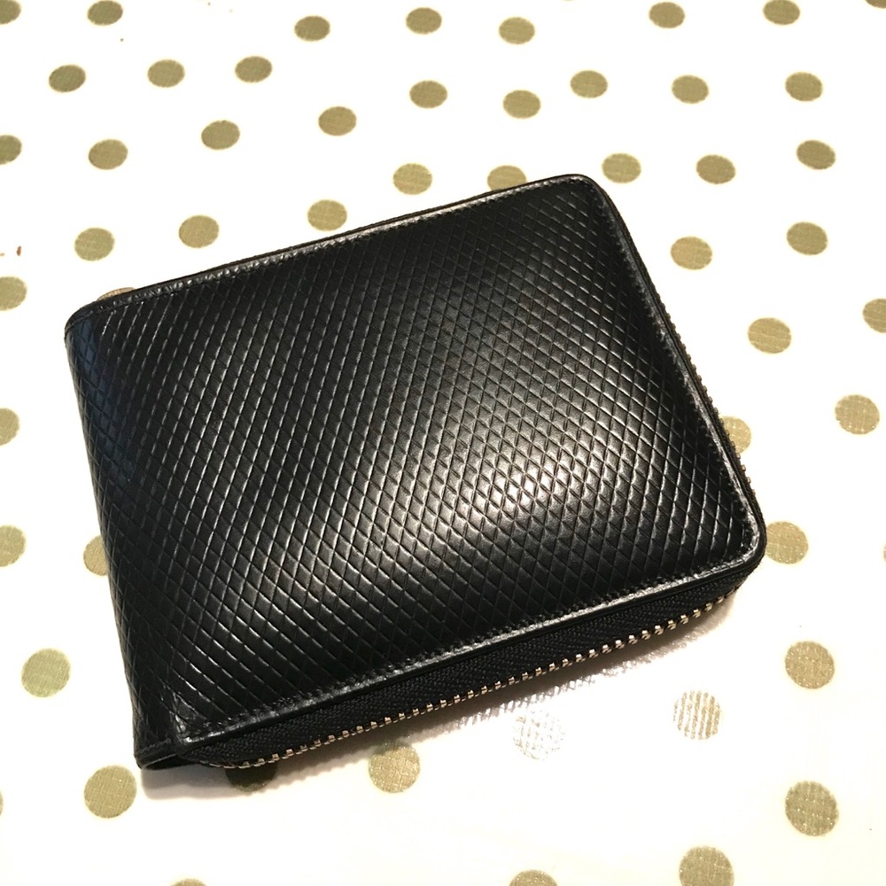 Comme Des Garçons leather wallet
